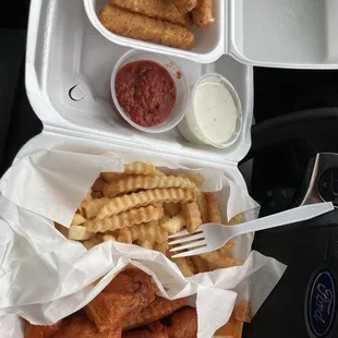 a tray of food and a fork