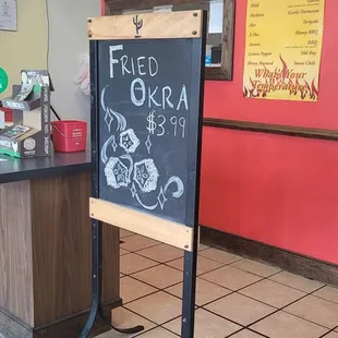 a sign in a restaurant