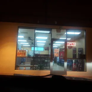 Front door- very far west end of shopping plaza next to Great Clips