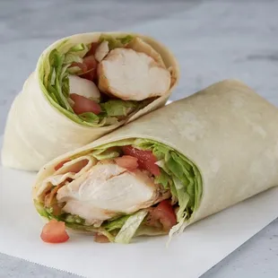 a wrap of chicken and lettuce