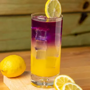 a purple and yellow cocktail