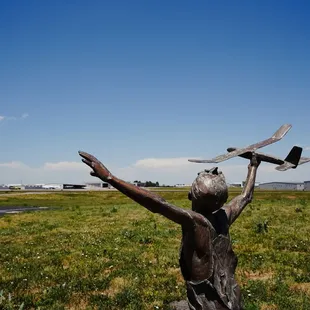 A statue outside of the Exploration of Flight hangar. It's facing the Centennial Airport.
