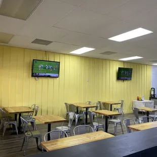 a restaurant with tables and chairs