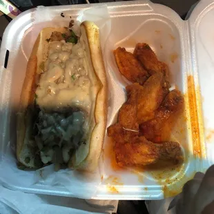 Cheesesteak and wings .