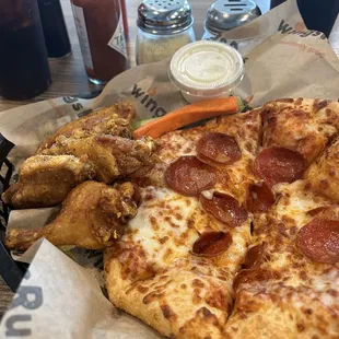 a pizza with pepperoni and cheese