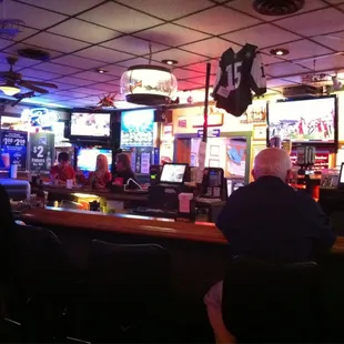 people sitting at the bar