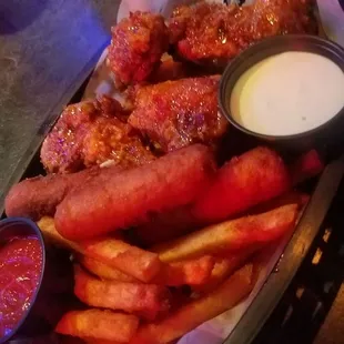 Sampler app, fries, wings with a yummy chili sauce and cheese sticks.