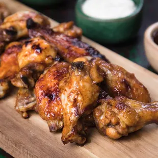 chicken wings on a cutting board