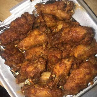 Soggy with enough sauce (on the bottom) to cover 2 wings.