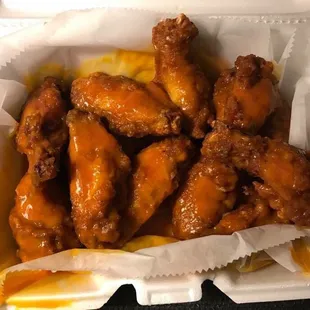 chicken wings in a styrofoam container