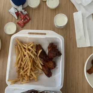 Buffalo mild bone in wings, honey bbq bone in wings, fries, ranch.