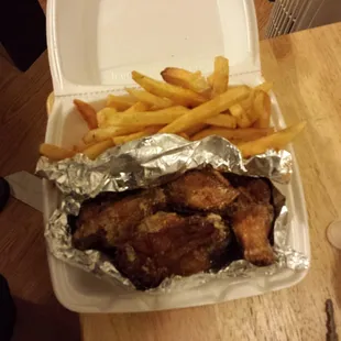 Garlic parmesian. Fridsy special 8 wings and fries for 6.99