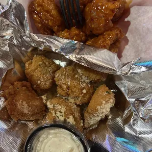 Garlic Parmesan and Sweet and Spicy boneless wings.