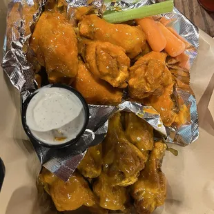 Dozen bone-in wings 1/2 gold, 1/2 medium buffalo.  Very meaty and crispy