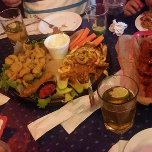 The feast. Sampler. Lemon pepper extra hot wings.