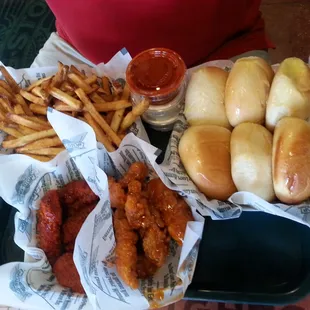 Dinner for two with Cajun and mango habanero sauces.  Good and hot. Definitely spring for the year rolls!