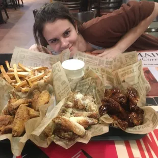 Teriyaki, lemon pepper, and garlic Parmesan wings...with a ham in the background!