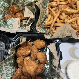 Hawaiian barbecue boneless wings, buffalo wings and large fries