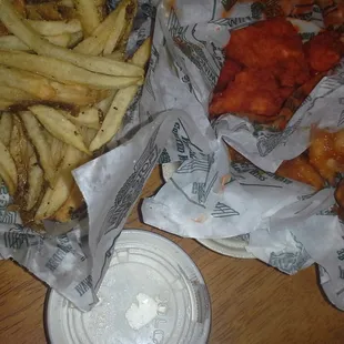 Half mango habanero, half orignal hot boneless wangs