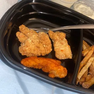 This chicken is also supposed to be well done. Which it isn't. And there's barely any sauce or dry seasoning on the chicken.