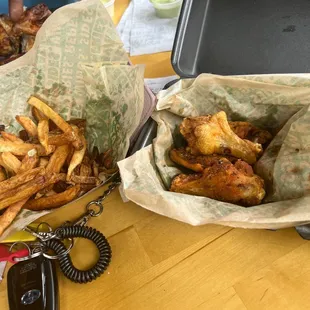 two baskets of food on a table