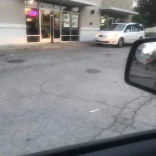 Not only is it park next to Do not park sign it's blocking handicap ramp