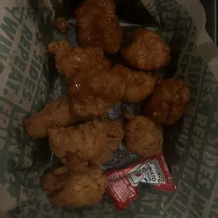 Lemon Pepper Chicken, each one was smaller than the ketchup packet. Ridiculous