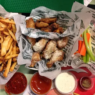 Seasoned fries, 15 wings (lemon pepper &amp; garlic parmesan), veggies w/ atomic and mango habanero sauce
