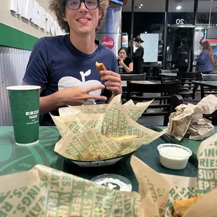 8 wings, 5 chicken fingers, 2 orders of fries and 2 drinks