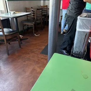 Dirty tables.. floor is sticky and disgusting store is not busy all they doing is singing and yelling and not bother to come out and clean