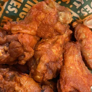 a basket of fried chicken wings