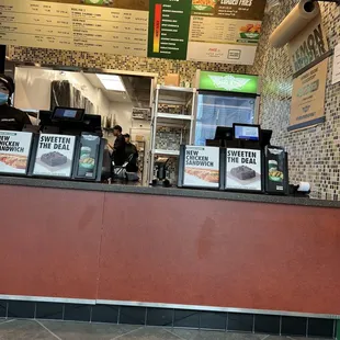 a view of the counter at a restaurant