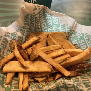 a basket of french fries and a cup of coffee