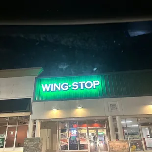 the front of the store at night