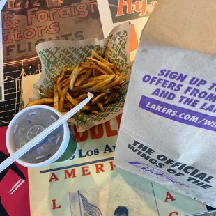 Regular size fries and a drink in there bag and I have the 8 piece combo ( smoked hickory bbq and lemon pepper )