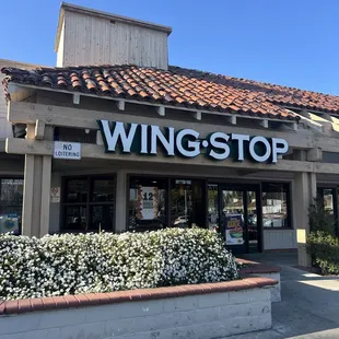 the front entrance of a restaurant