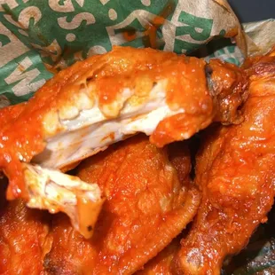 Undercooked! Soggy, chewy wings. $64 down the drain