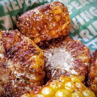 a close up of a basket of fried food