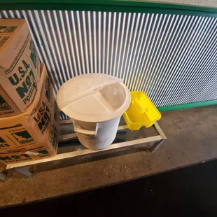 The lid is clearly open. It said starch flower on the lid.