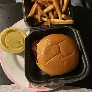 a hamburger and fries on a plate