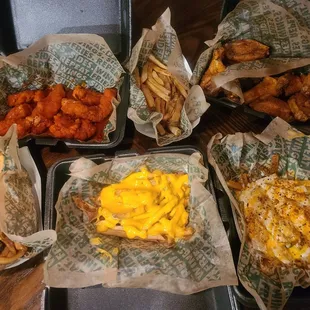 a variety of food in baskets on a table