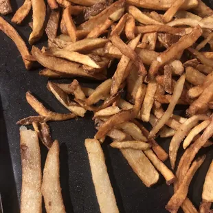 Raw and burnt fries that were sent.