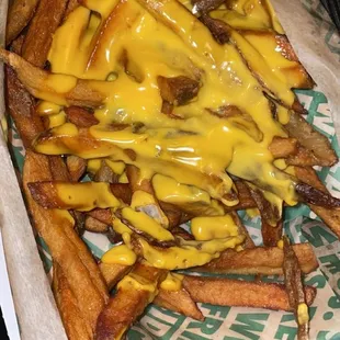 You can tell by how dark the fries are they were just thrown back into the fryer I took 2 bites and threw them away