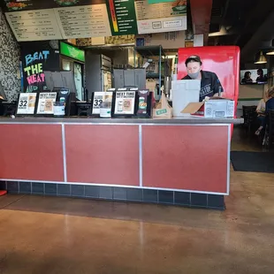 the counter area of a fast food restaurant