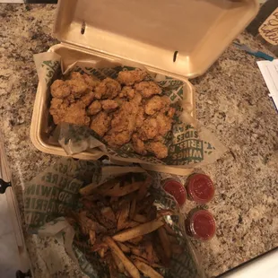 Lemon pepper thighs and seasoned fries