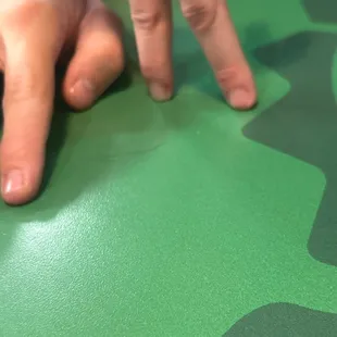 My friends saw this nasty hair stuck on the table and started playing with it.disgusting!!