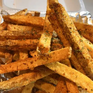 a close up of a tray of fries