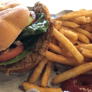 Pork tenderloin sandwich with seasoned fries