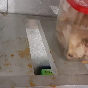 Rancid raw meat dripping over soda cans served to customers