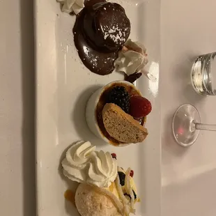 three desserts on a white plate
